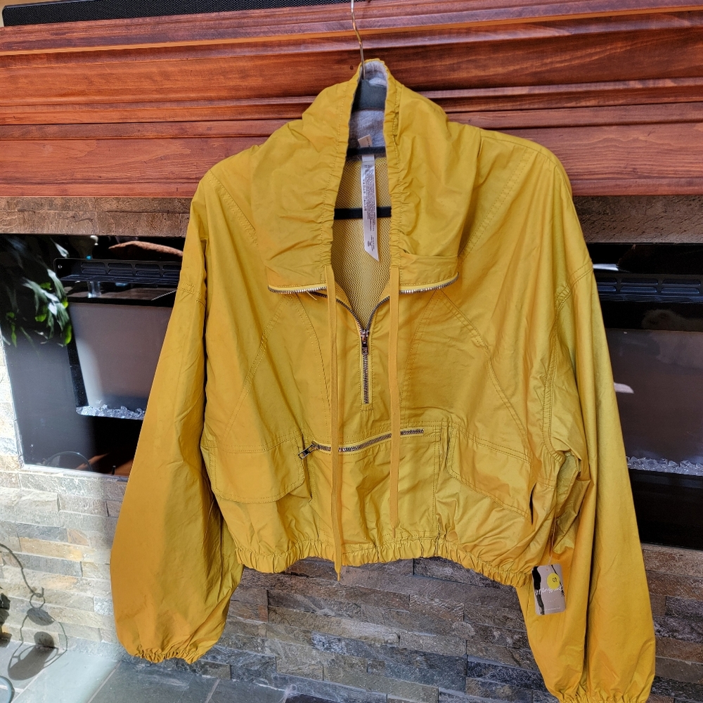 Free people movement yellow/ gold cropped jacket
